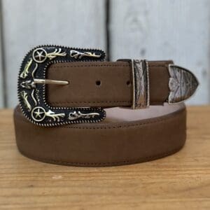 A brown belt with a metal buckle and some type of design