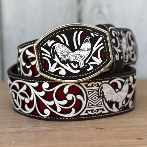 A close up of a belt with a rooster on it