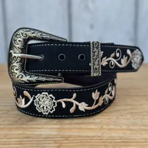 A black belt with white flowers and silver accents.