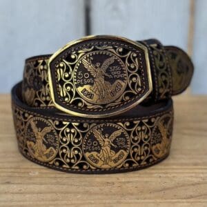 A belt with a gold design on it