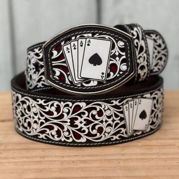 A black and white belt with cards on it