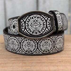 A black and white belt with an ornate design.