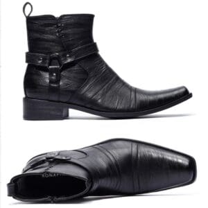 A pair of black boots with straps on the side.