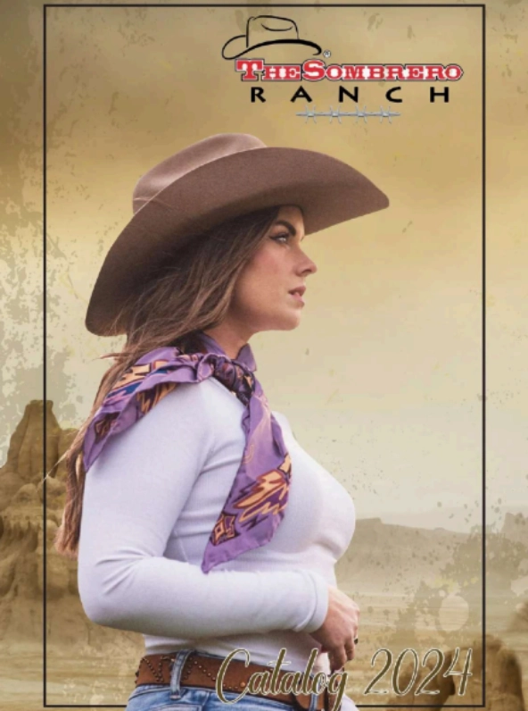 A woman in a cowboy hat and scarf.