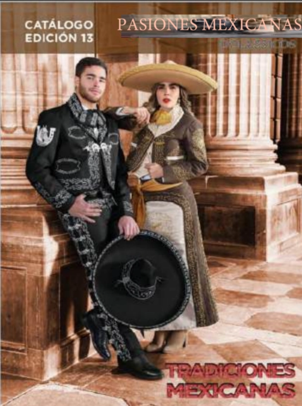 A man and woman dressed in mexican clothing.